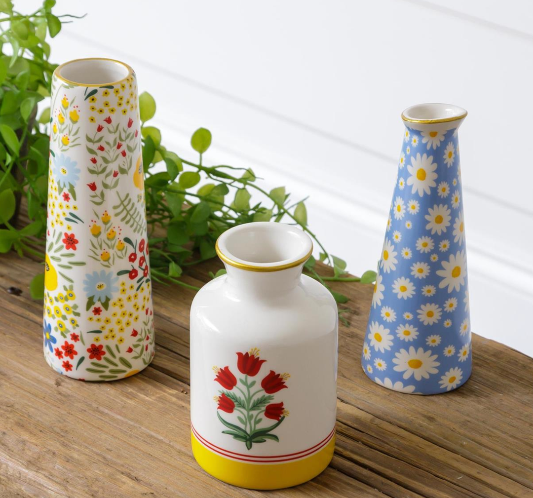 Bud vases scattered petals