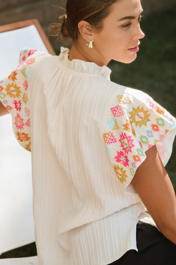 Embroidered Flutter Ruffle Sleeve Top