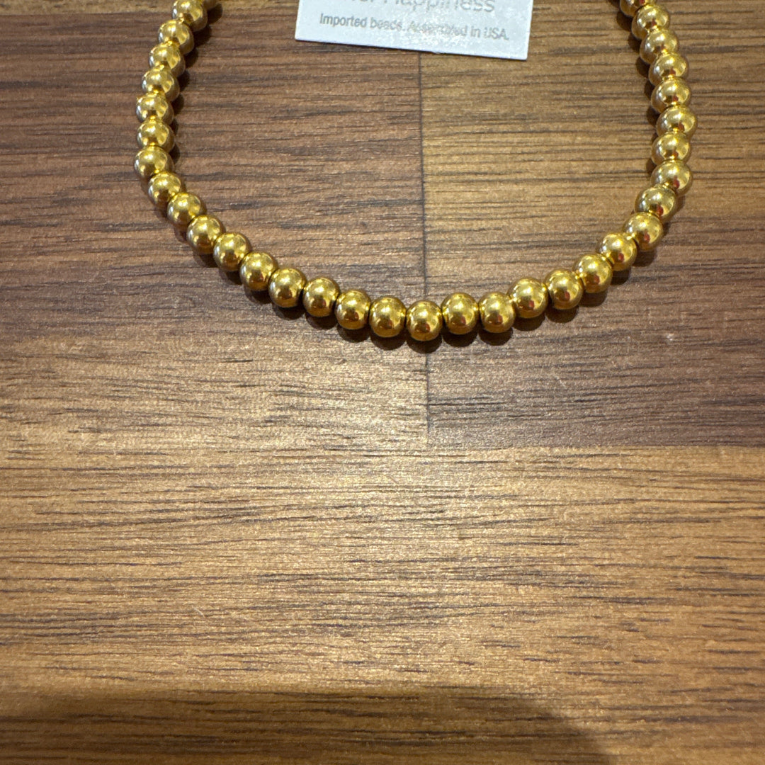 Non tarnish 4mm gold hematite bracelet