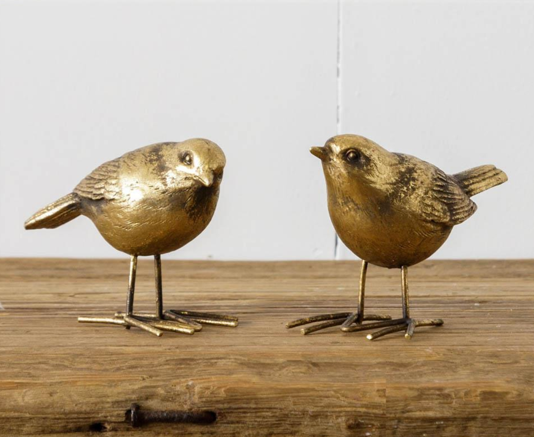 Small brass bird