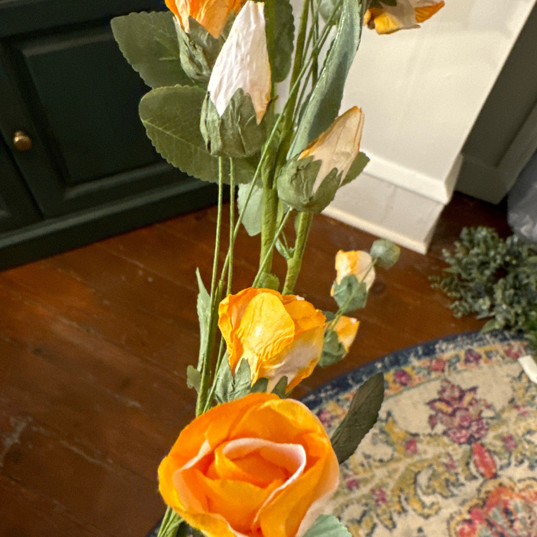 Orange rose bud bush