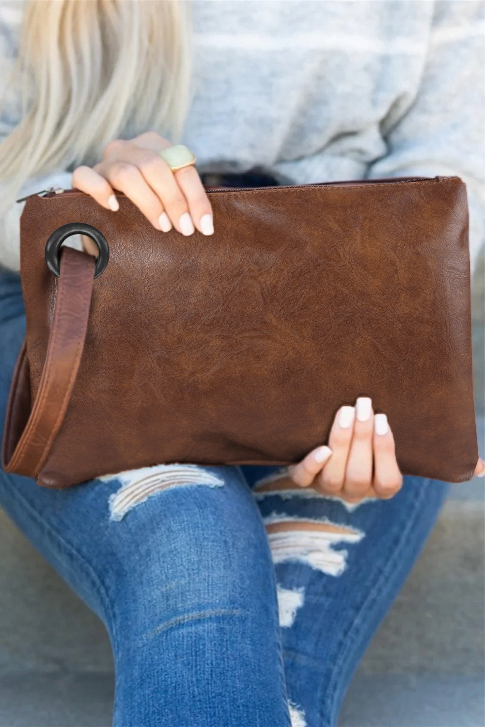Brown oversized clutch bag