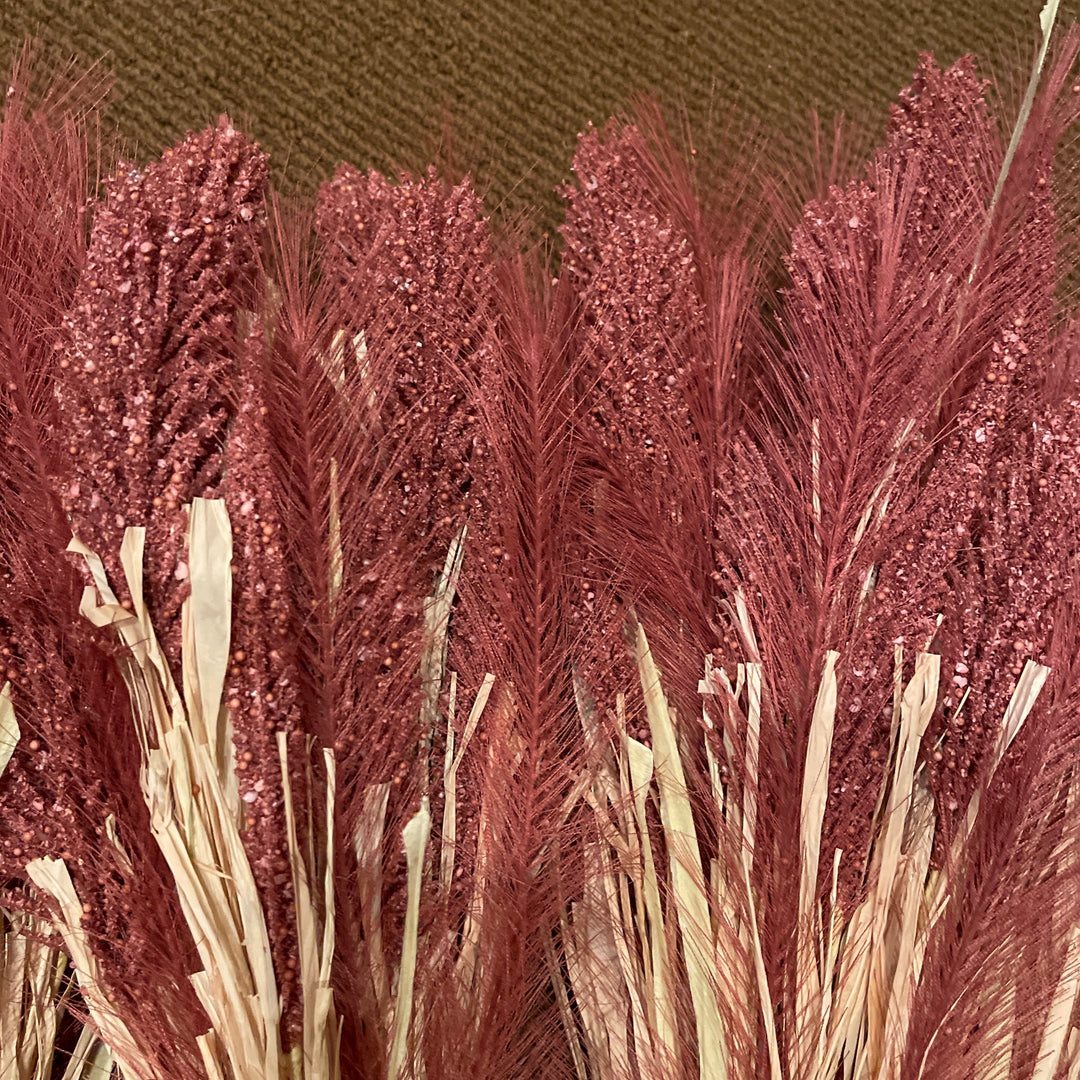 Coral colored straw bunch