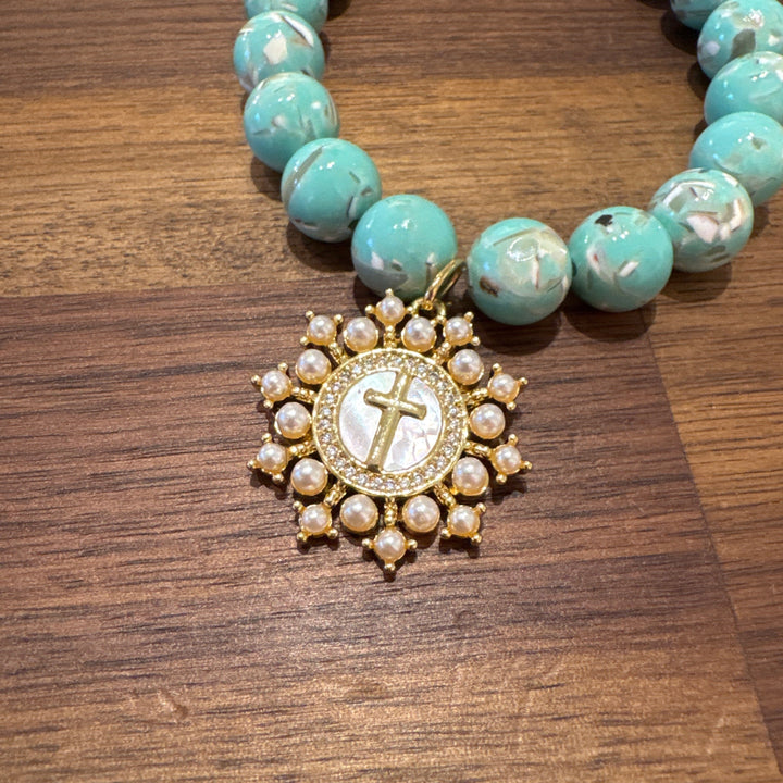 Pearl starburst cross bracelet