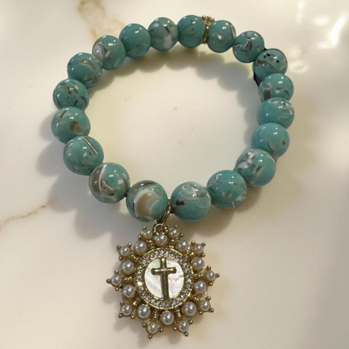 Pearl starburst cross bracelet