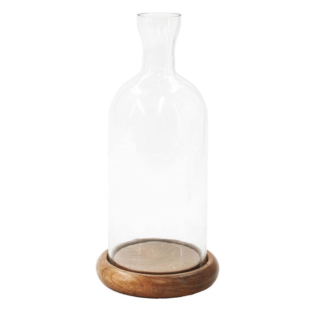 Glass vase on wood base